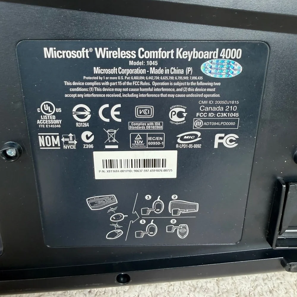 Microsoft Wireless Comfort Keyboard 4000 Ergonomic USB Model 1045 Silver Black‎